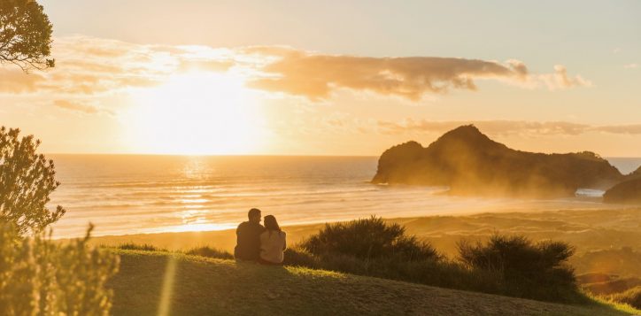 couple-watching-the-sunset-by-the-beach-2