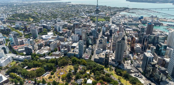 aerial-shot-of-auckland-featuring-skytower-and-albert-park-and-the-expanse-of-city-surrounding-2